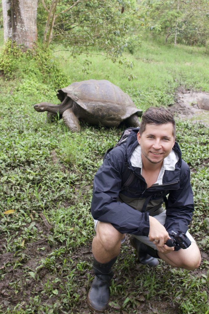 Crouching beside a wild giant tortoise on Santa Cruz, the land-based trip that costs a fraction of a cruise