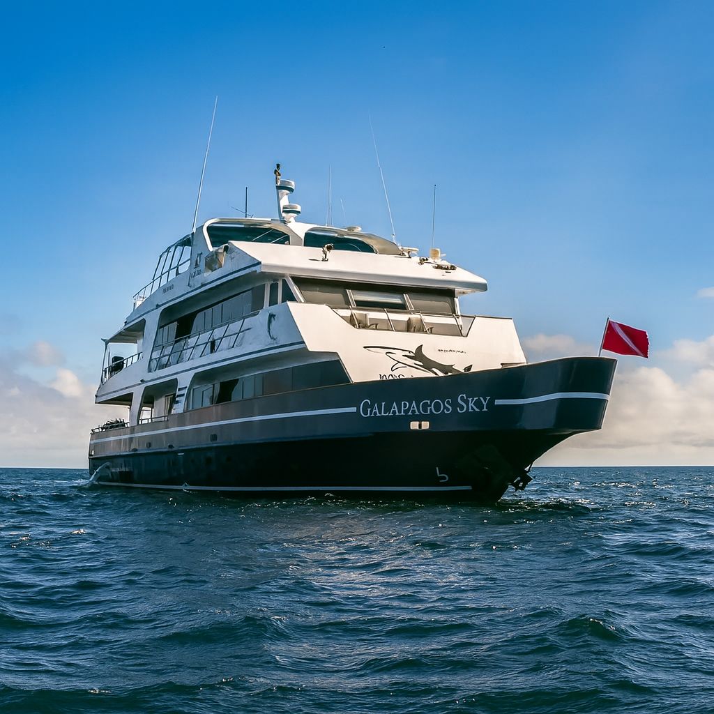 Galapagos Sky cruise yacht sailing through the Galapagos Islands during a June expedition with Cruises to Galapagos Islands