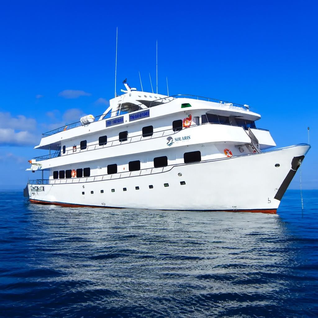 Solaris Galapagos Cruise ship sailing on calm ocean waters during a May expedition with Cruises to Galapagos Islands