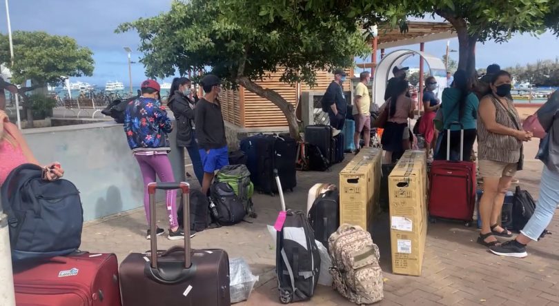 Travelers gathering before boarding a Galapagos cruise during the busy high season with Cruises to Galapagos Islands